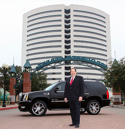 Robert McDorman standing outside tall building